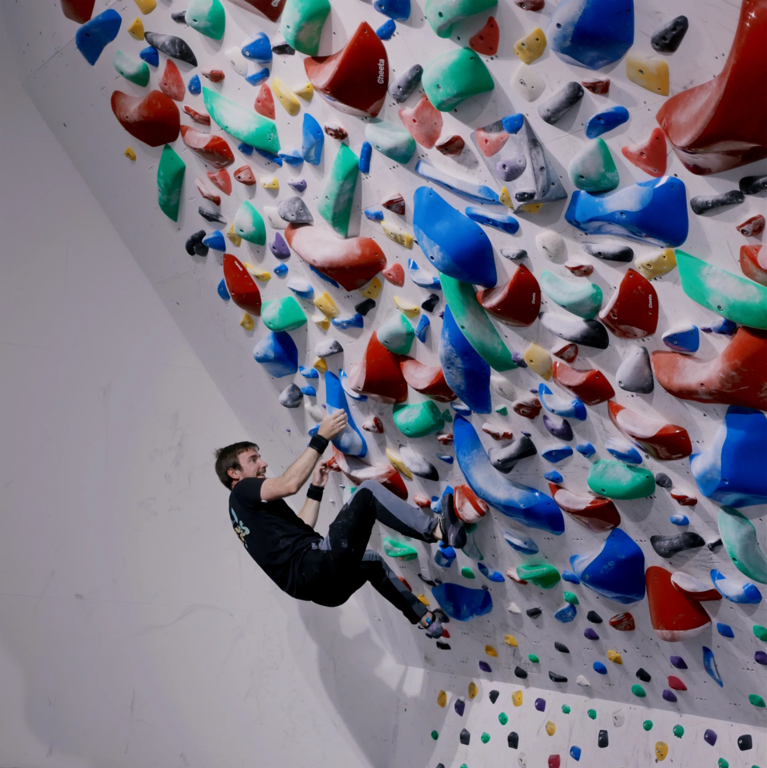 Climber on the spray wall during Sprayground competition at GoClimb