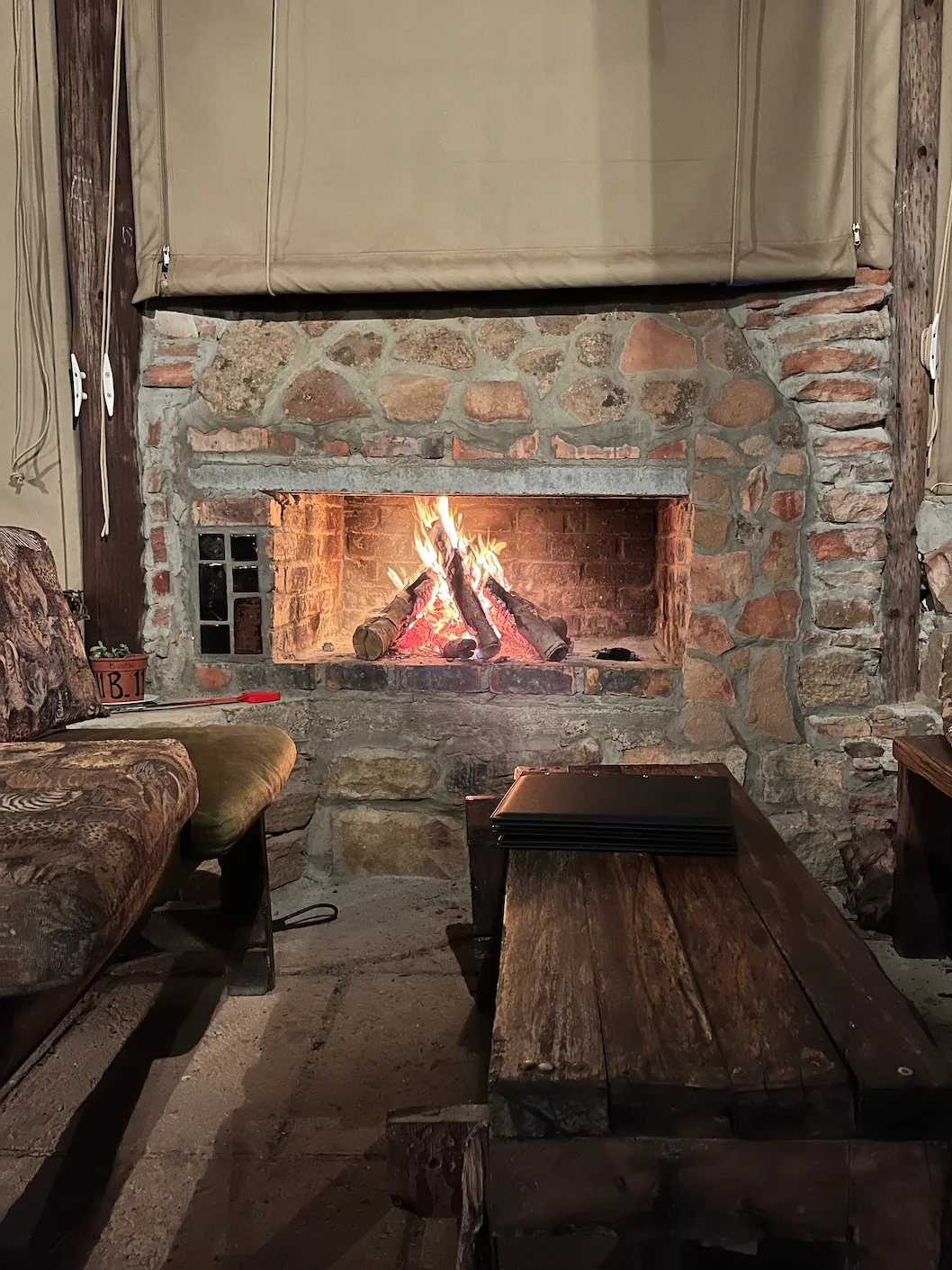 Warming by the fireplace at night